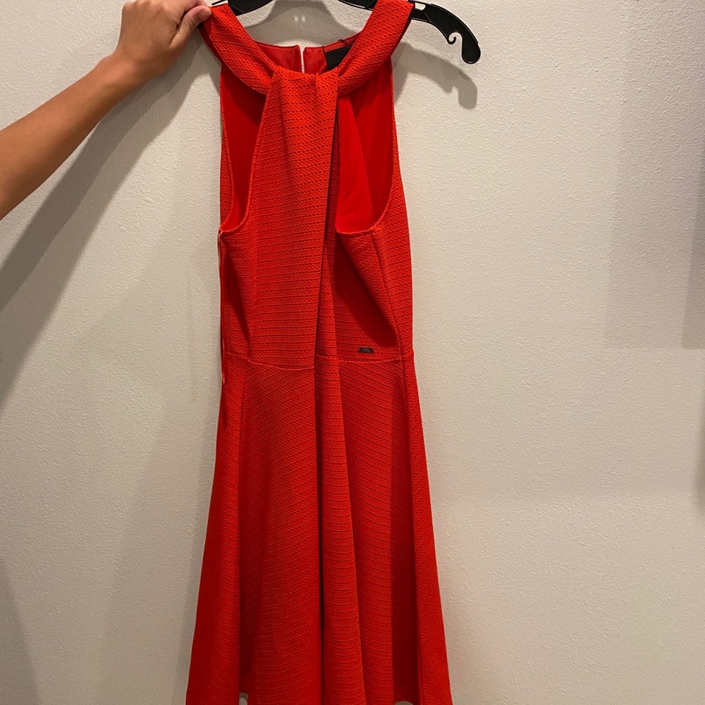 A red Armani Exchange dress